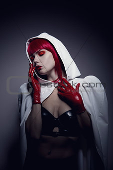 Sensual fetish woman wearing white hooded jacket  