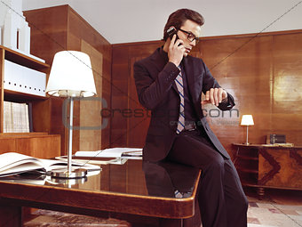 Businessman working at office desk