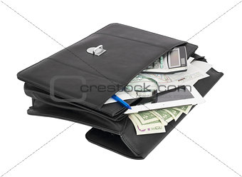 Open black briefcase and business objects