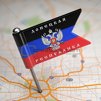 Donetsk People's Republic Small Flag on a Map Background.