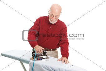 Senior Man Ironing