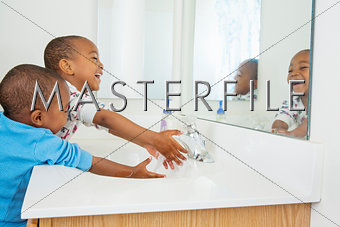 Boys washing hands