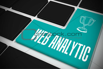 Web analytic on black keyboard with blue key