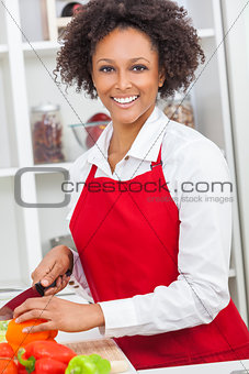 Mixed Race African American Woman Cooking Kitchen