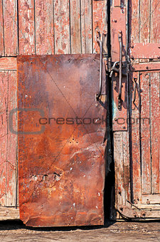 old wooden door with iron -coated