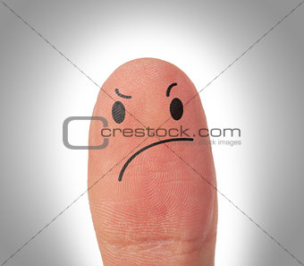 Female thumbs with smile face on the finger