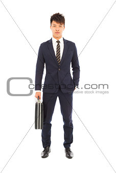  businessman holding a briefcase and hand in his pocket