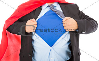 Businessman pulling his t-shirt open in white background