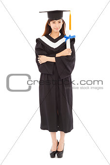 full length young woman college graduation isolated