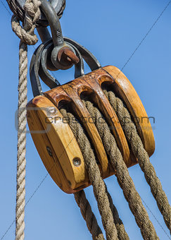 Old wooden pulley on a ship in Lubeck
