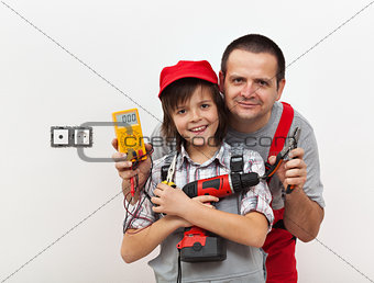 Boy and his father ready for some electricity work