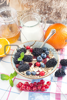 Healthy breakfast with granola and fresh berries
