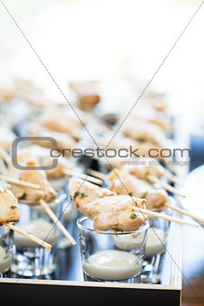 Chicken pieces on skewers