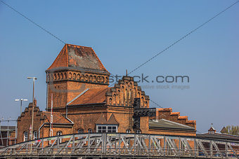 Steel bridge and old building in Lubeck