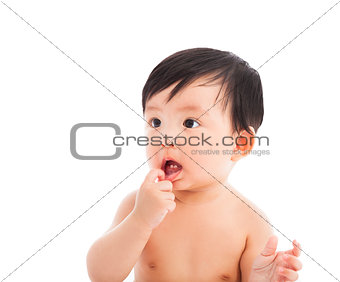 adorable Infant child baby sitting and look up