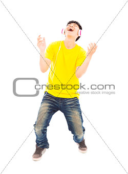 young man listening music and yelling out