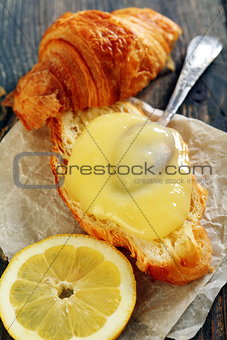 Croissant with cream and lemon.