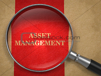 Asset Management. Magnifying Glass on Old Paper.