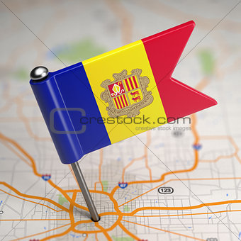 Andorra Small Flag on a Map Background.