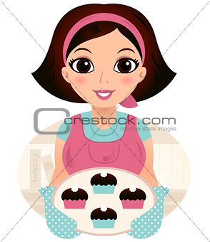 Young baking woman holding cookies
