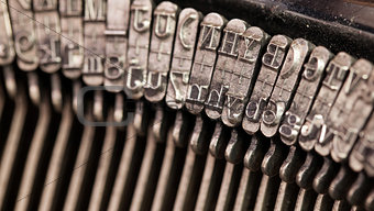 Close-up of an old retro typewriter with paper