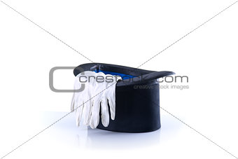 Black magician top hat with a pair of white gloves 