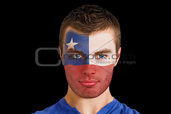 Serious young chile fan with facepaint