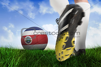 Football boot kicking costa rica ball