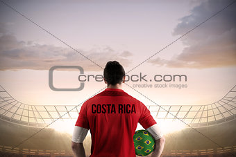 Costa rica football player holding ball