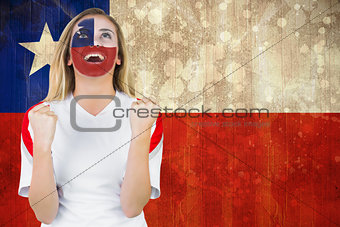 Excited chile fan in face paint cheering