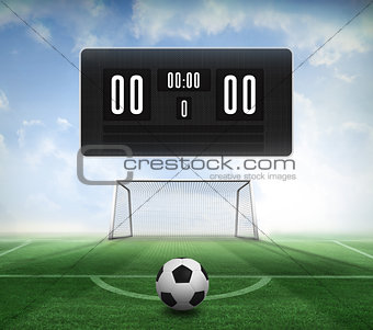 Black and white football and scoreboard
