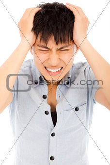 young man have a headache and feel very painful 