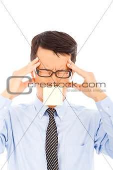 businessman with headache expression and sticker 