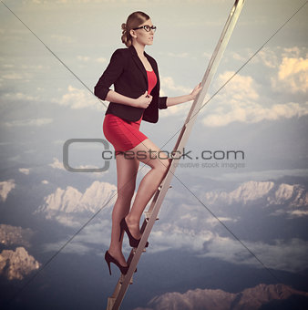 business woman climbing 