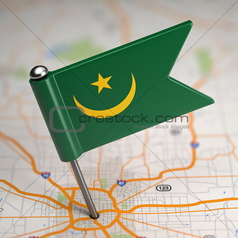 Mauritania Small Flag on a Map Background.