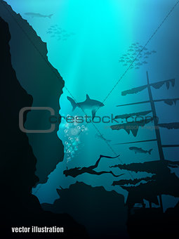 Beautiful coral reef and silhouettes of diver and school of fish in a blue sea