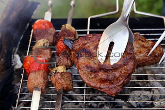 beef steak grilled on a barbecue outdoors