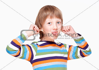 Boy Pulling his Ears and Sticking out Tongue 