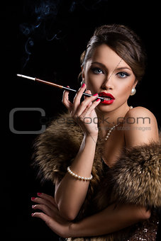 Retro. Beautiful, attractive woman wearing fur