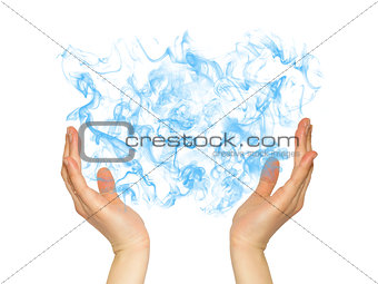 Hands holding blue smoke