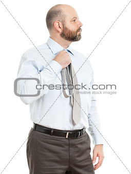 business man selects tie