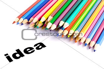 many colored pencils near the word idea