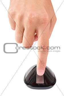 Finger points to scroll wheel of touch computer mouse isolated