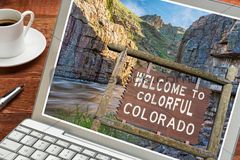 Colorado welcome sign on laptop