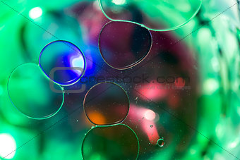 Coloured Bubbles on Water Surface: Globules