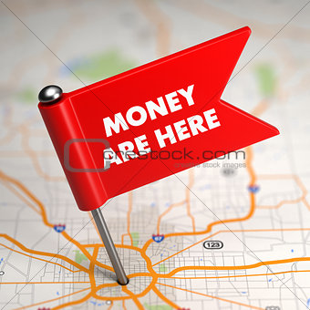 Money Are Here - Small Flag on a Map Background.