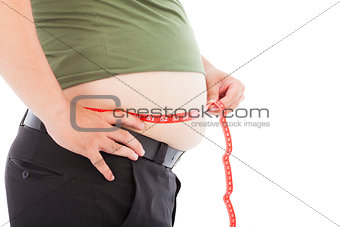 fat man use scale to measure his waistline