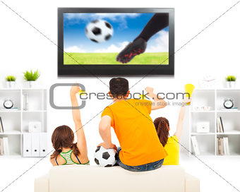 young fans yelling  and while watching soccer game