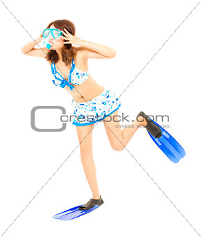 cute young woman make a pose with a scuba equipment