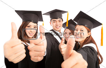 happy group graduate students thumbs up together